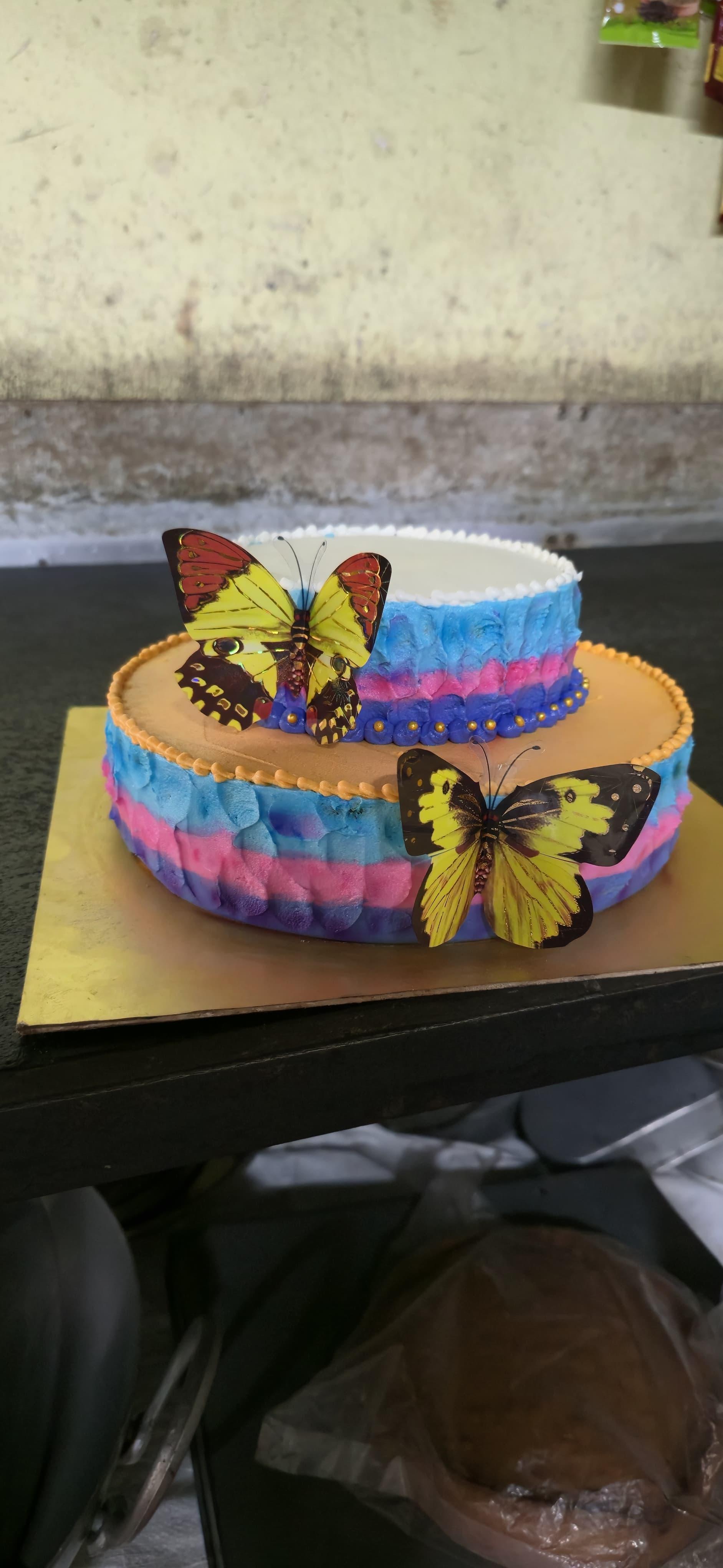 Custom butterfly theme Step cake with design
